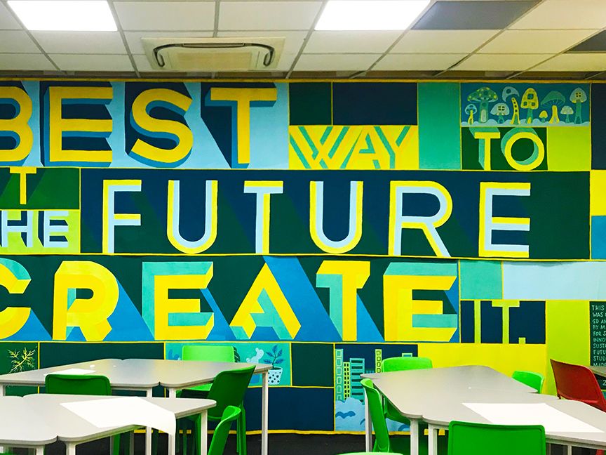 Photograph of a brightly painted mural in a classroom.
