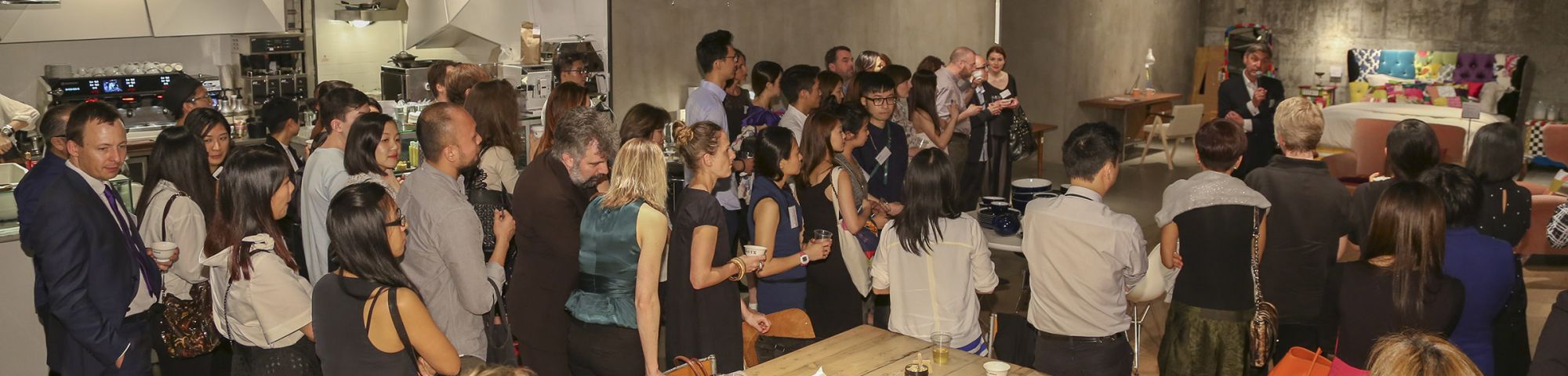 Group of people listening to someone talk
