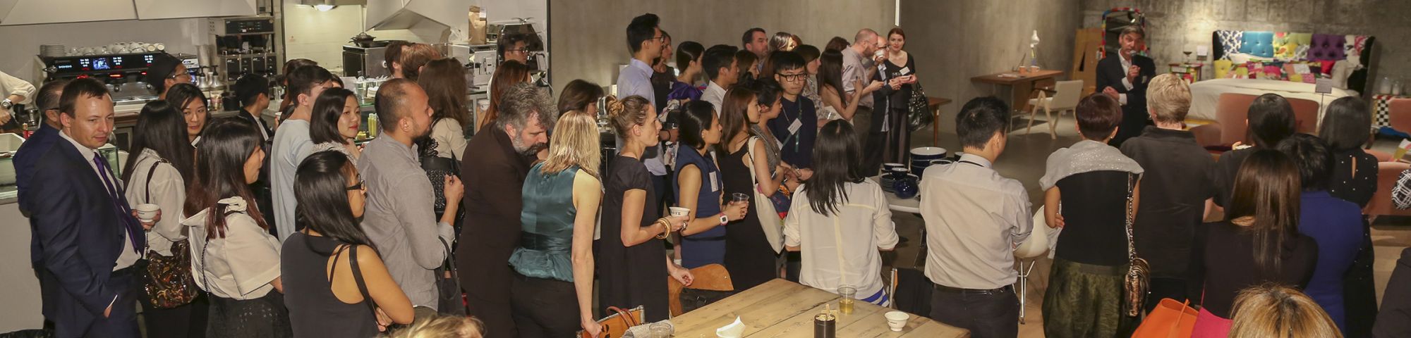 Group of people listening to someone talk