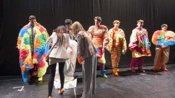 students performing in the theatre