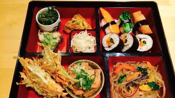 A filled bento box on a table