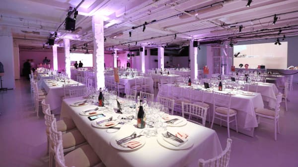 LCF's Fashion Matters gala dinner and auction tables set for the evening in basement of Victoria House in Bloomsbury