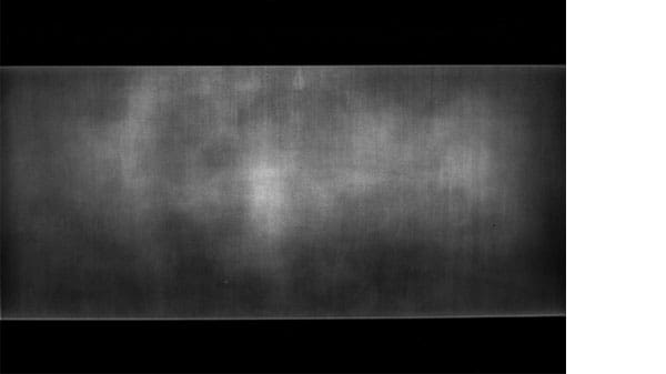 A grey distorted image with black background