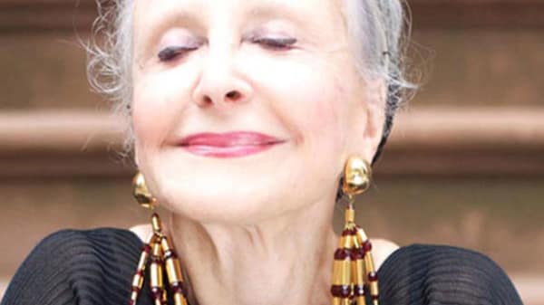 Photo of an older lady with her eyes shut