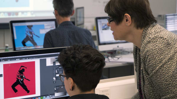 students working in the Mac suite