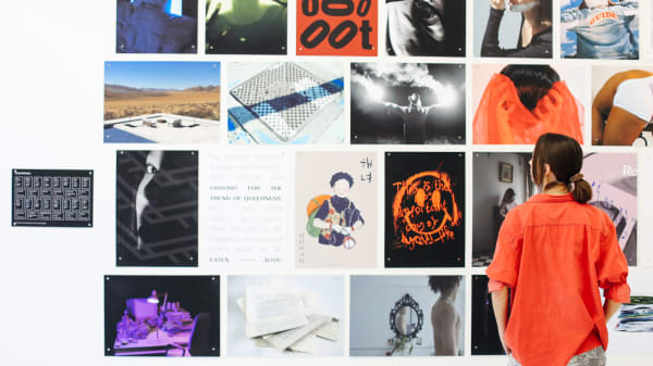 Girl looking at posters