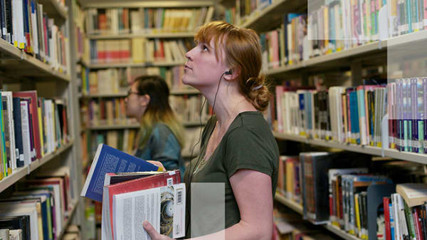 Pedagogy Reading Group, woman in library