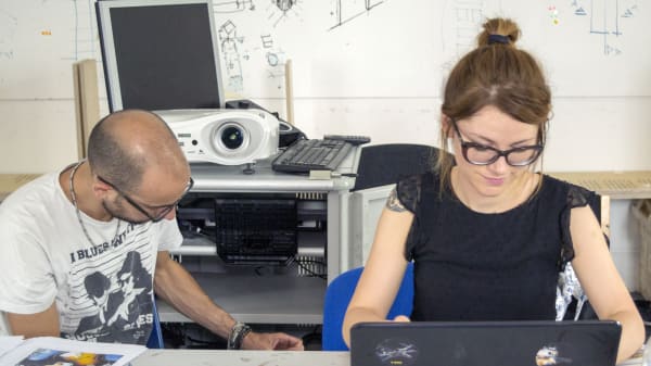 Graphic Designers working on a project