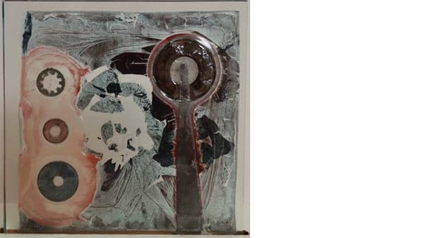A mixed media piece in white pink and red