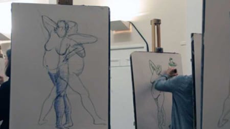 Someone sketching a body at a life drawing class
