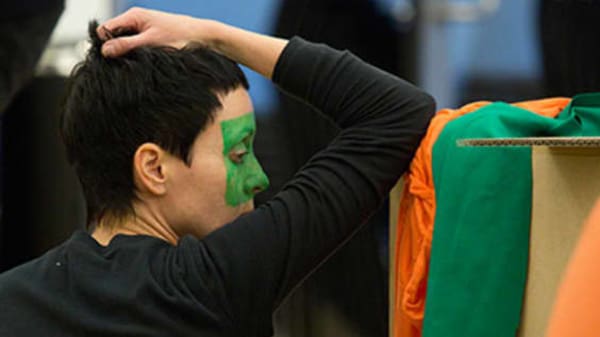 Woman with green face paint