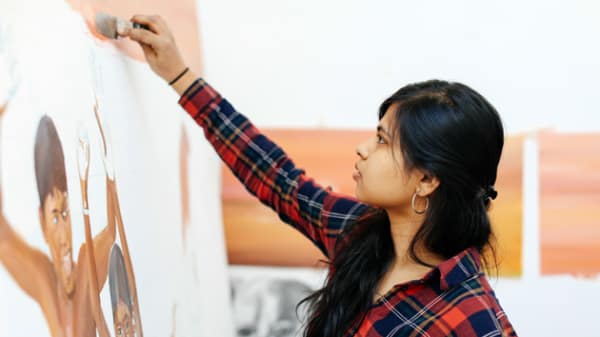 Student painting at Camberwell