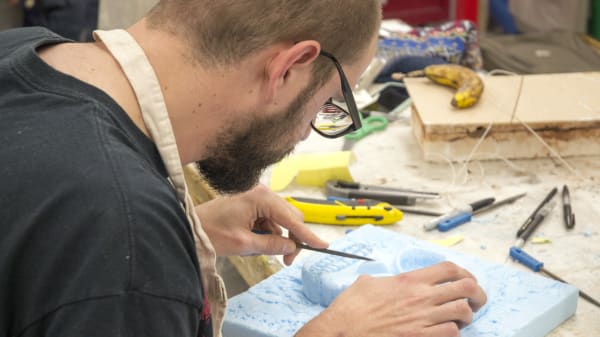 Student creating a mould during Prop Making