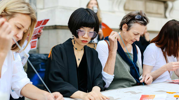 Students participating in a work shop