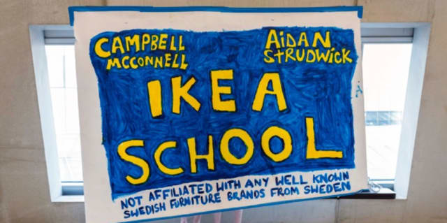 Handmade sign with 'Ikea school' written on it