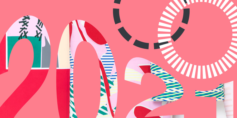 pale pink background with numbers 2021 in decorative red, green and white font