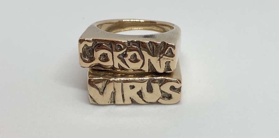 Two rings, spelling out Corona-Virus