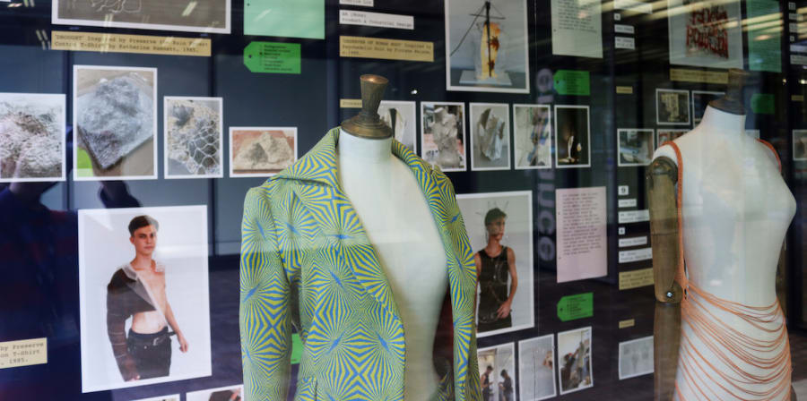 manniquins in window of museum