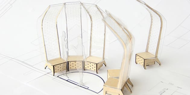 A small model chair made from wood and plastic