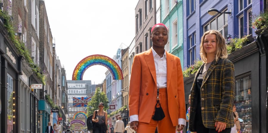 Photo of Takudzwa Chigaduro and Leisha Parlour standing in Carnaby Street