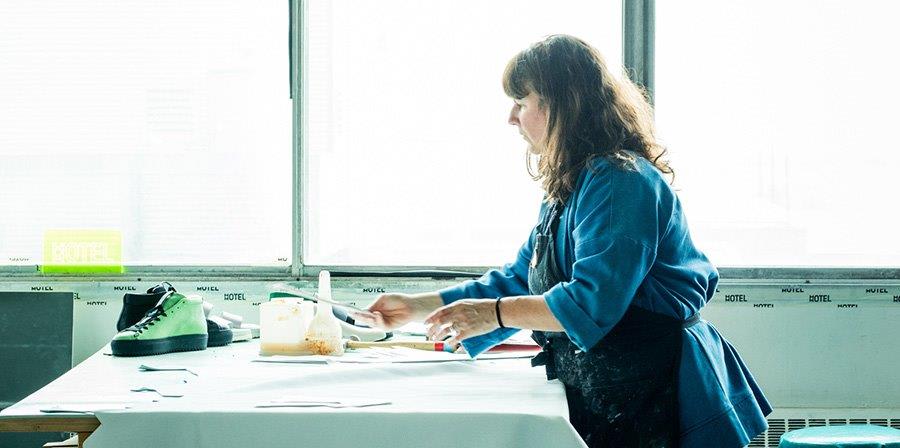 Woman working in front of a window
