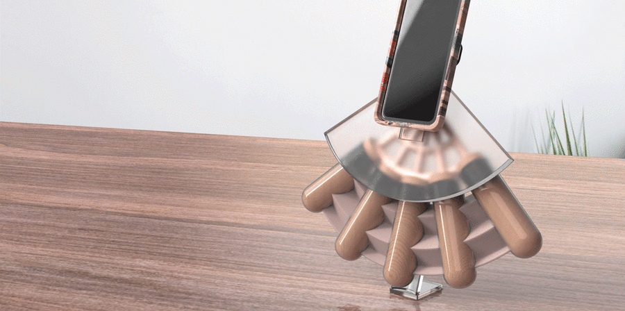 Mobile phone sitting in a stand shaped like a fan