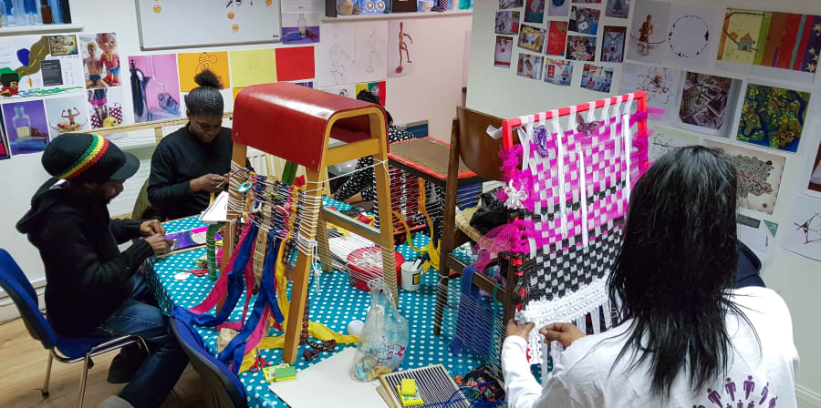 People making objects in an art workshop