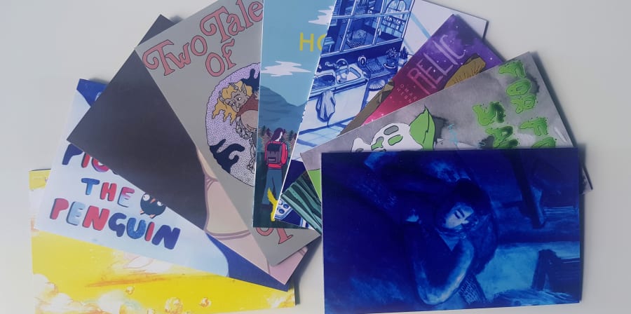 Collection of student zines from the Zine Making Workshop