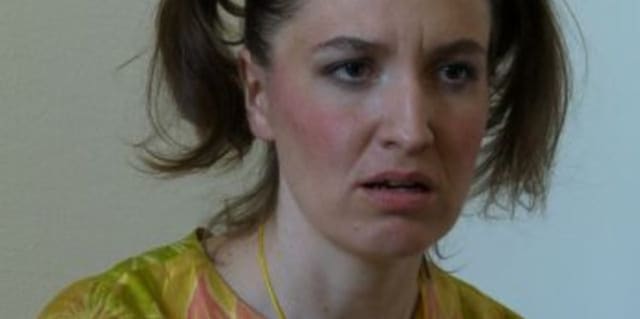 A woman looking perplexed