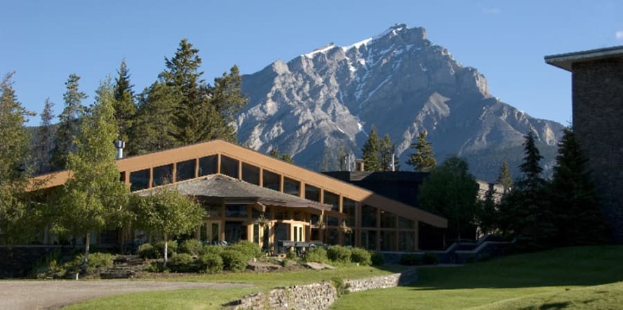 Image of blue sky and Banff art centre building in front