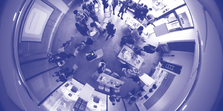 Fish-eye photography of people in room