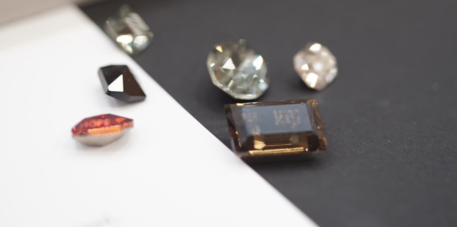 Close up of engraved Swarovski crystals used in Imogen Burgh's rings