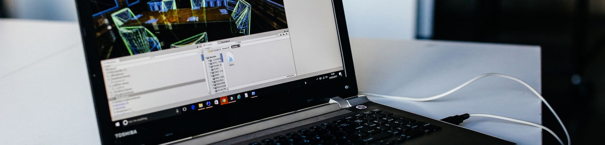 Close up image of a laptop screen and keyboard