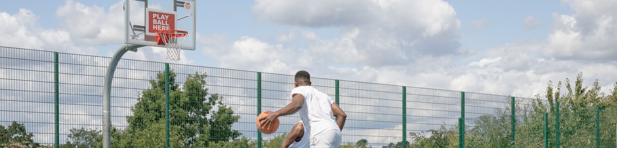 basketball player on blue court