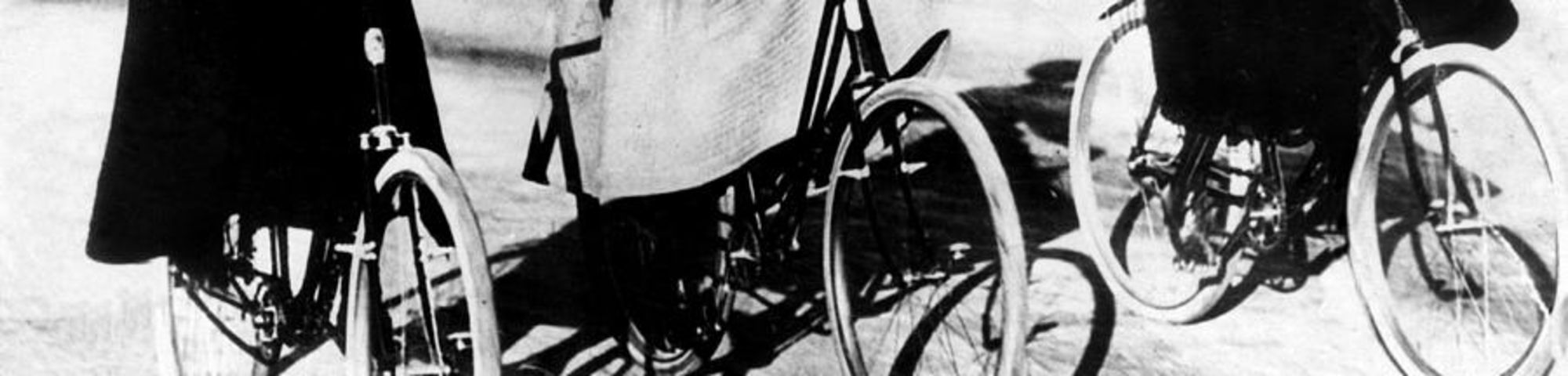 3 women riding bicycles, circa 1900