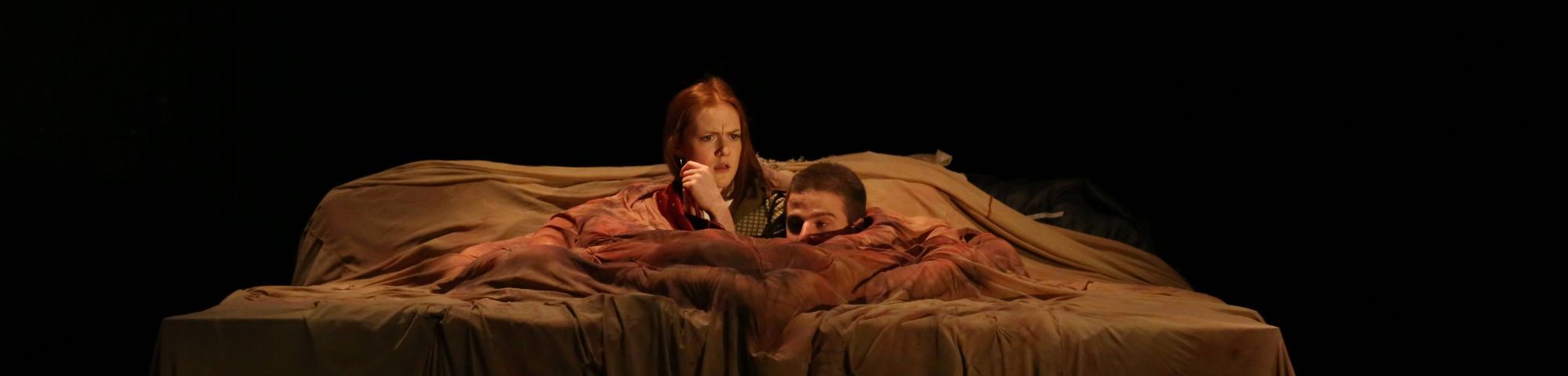 Man and women waking up with confused facial expression