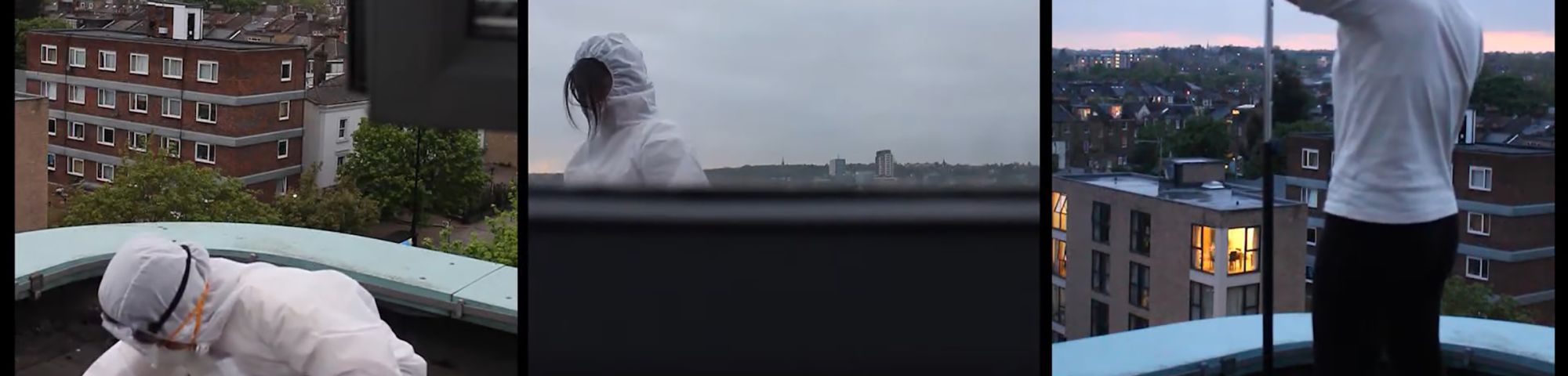 person in a paper suit and maske investigating a terrace balcony