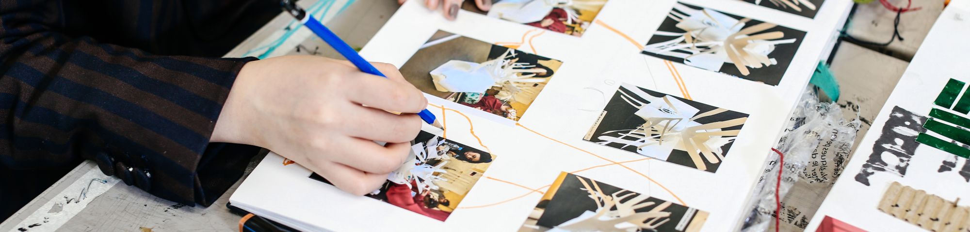 Student working in sketchbook