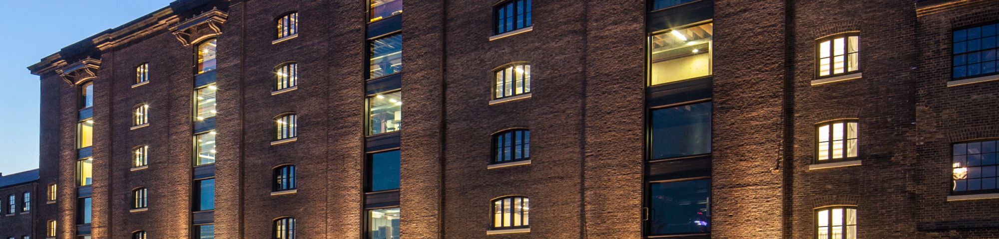 Exterior of Central Saint Martins' Granary Square building at night