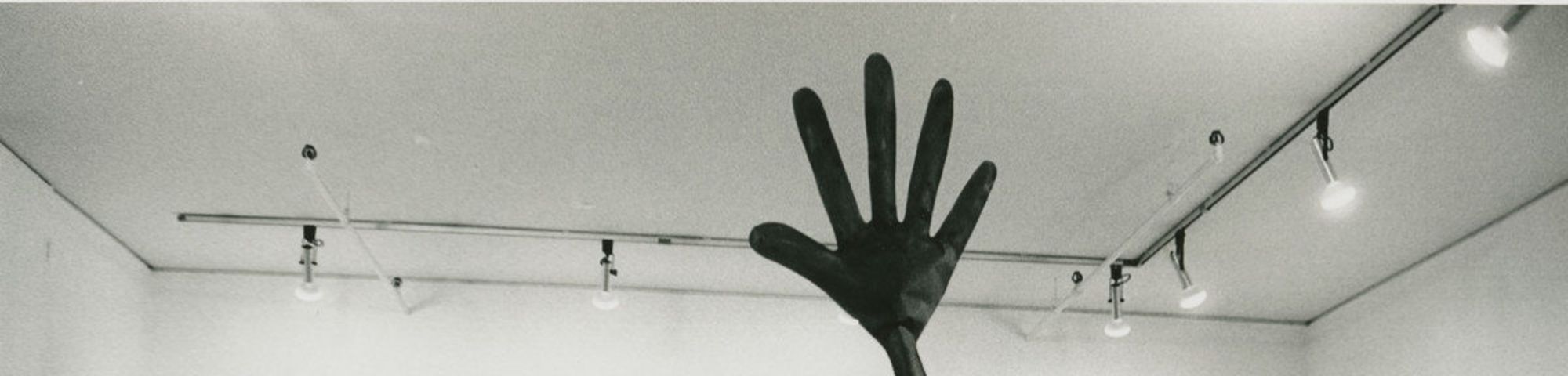 an art perfomance with gigantic gloves