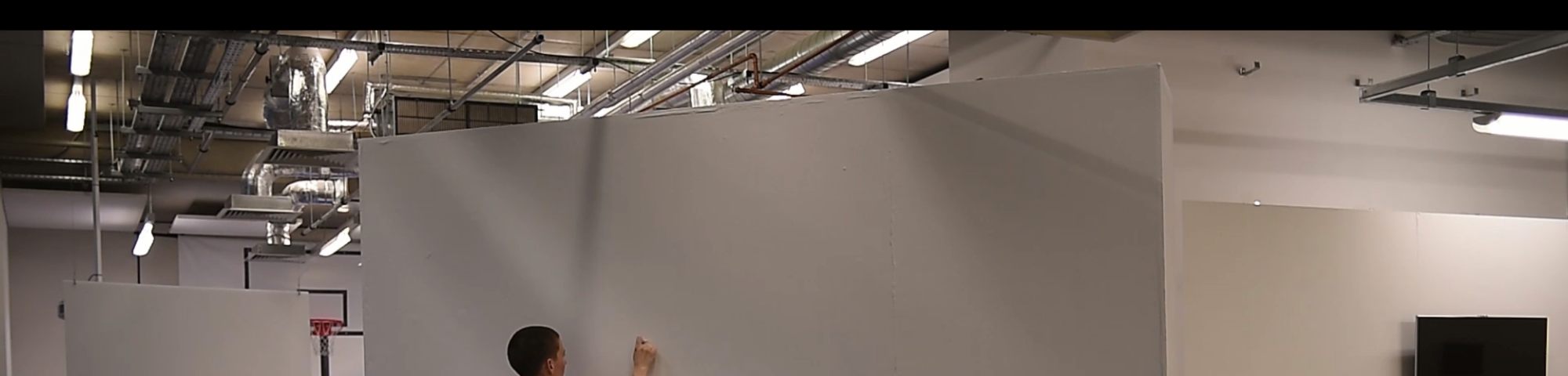 Women at white wall