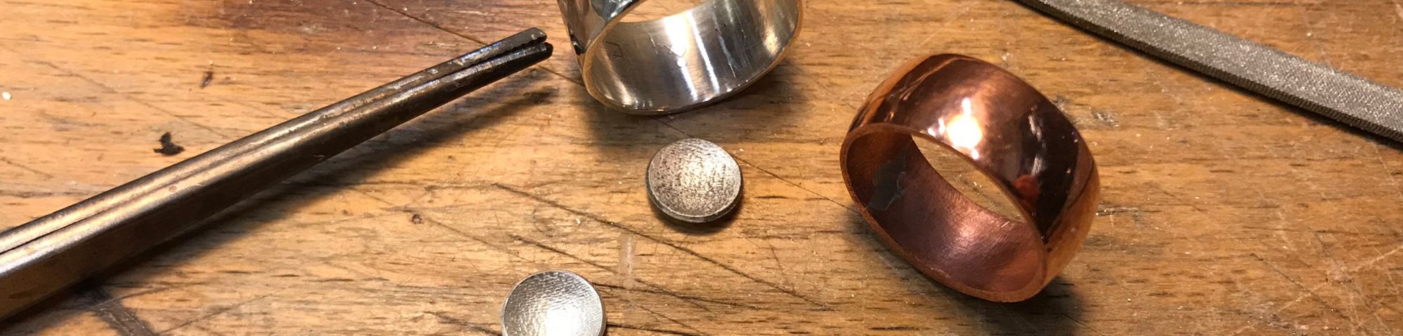 Page banner image. Kate Febbraro's jewellery work on studio desk.