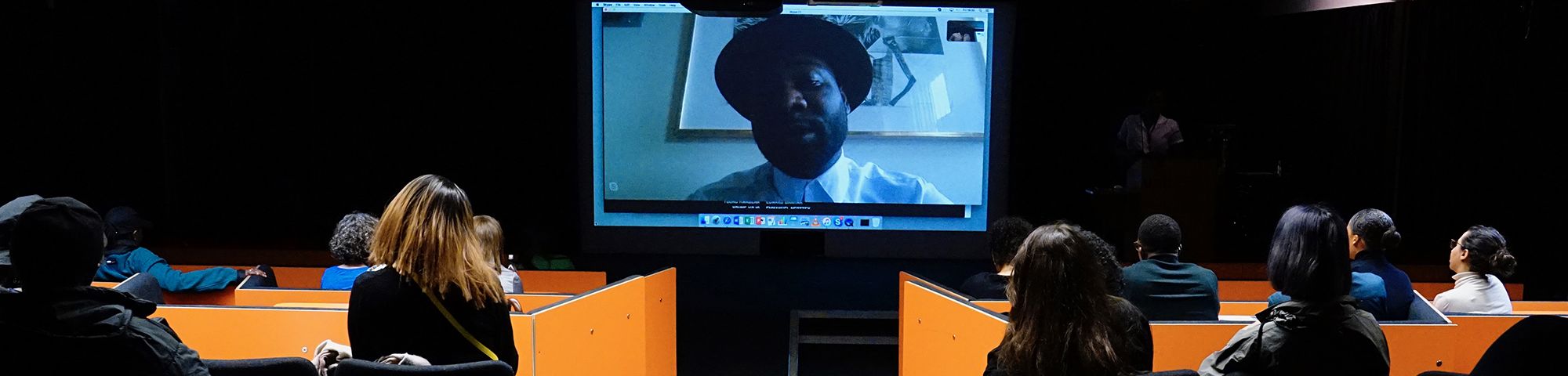 A shot of a skype conversation in a lecture theatre