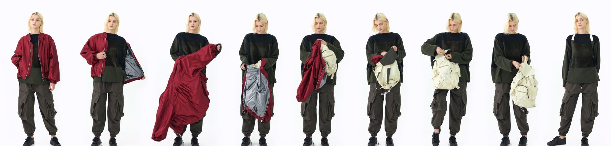 Female model in black sweater and red jacket