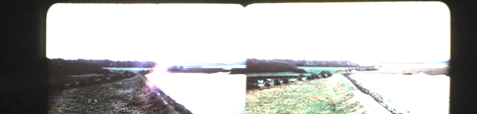 Movie still of people in a cinema watching the film, River Yar.