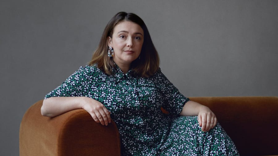 photo of woman on a sofa