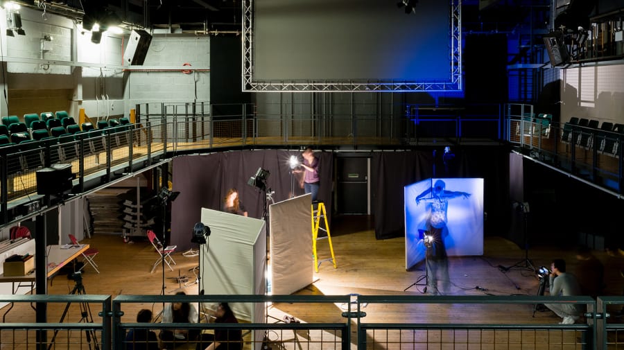 Students working in the Wimbledon College of Arts theatre.
