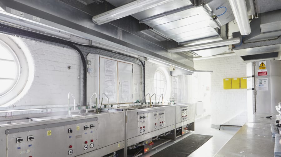 Dye vats in the Chelsea textile workshops.