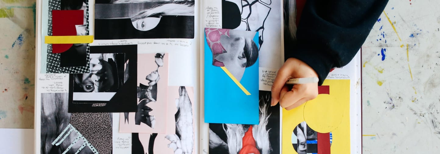 Student working on a collage