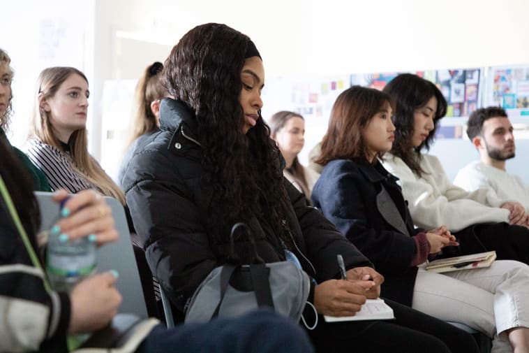 An audience of students attend one of the GBI industry events.